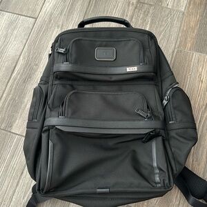 Black Tumi backpack only used once in excellent condition.